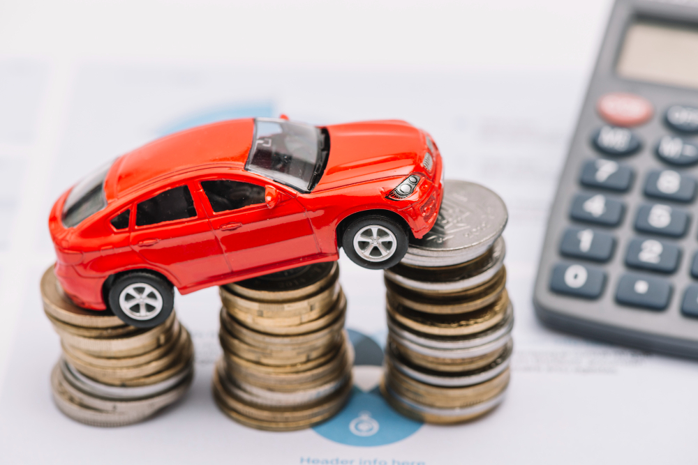 A car on top of a pile of coins
